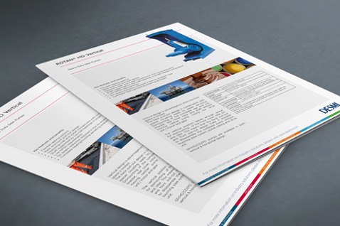Brochures showcasing DESMI products for marine and industrial applications on a table.