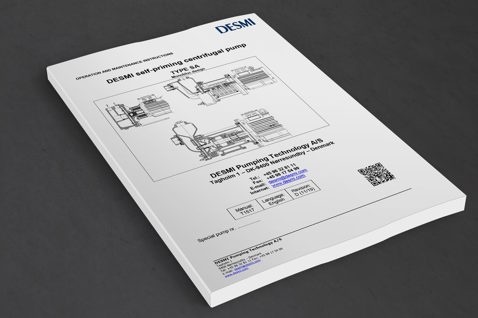 DESMI självsugande centrifugalpumpmanual, Typ SA, på en grå yta.