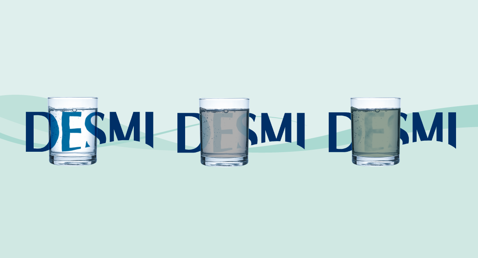 Three glasses with varying water clarity, overlaid with "DESMI" text.