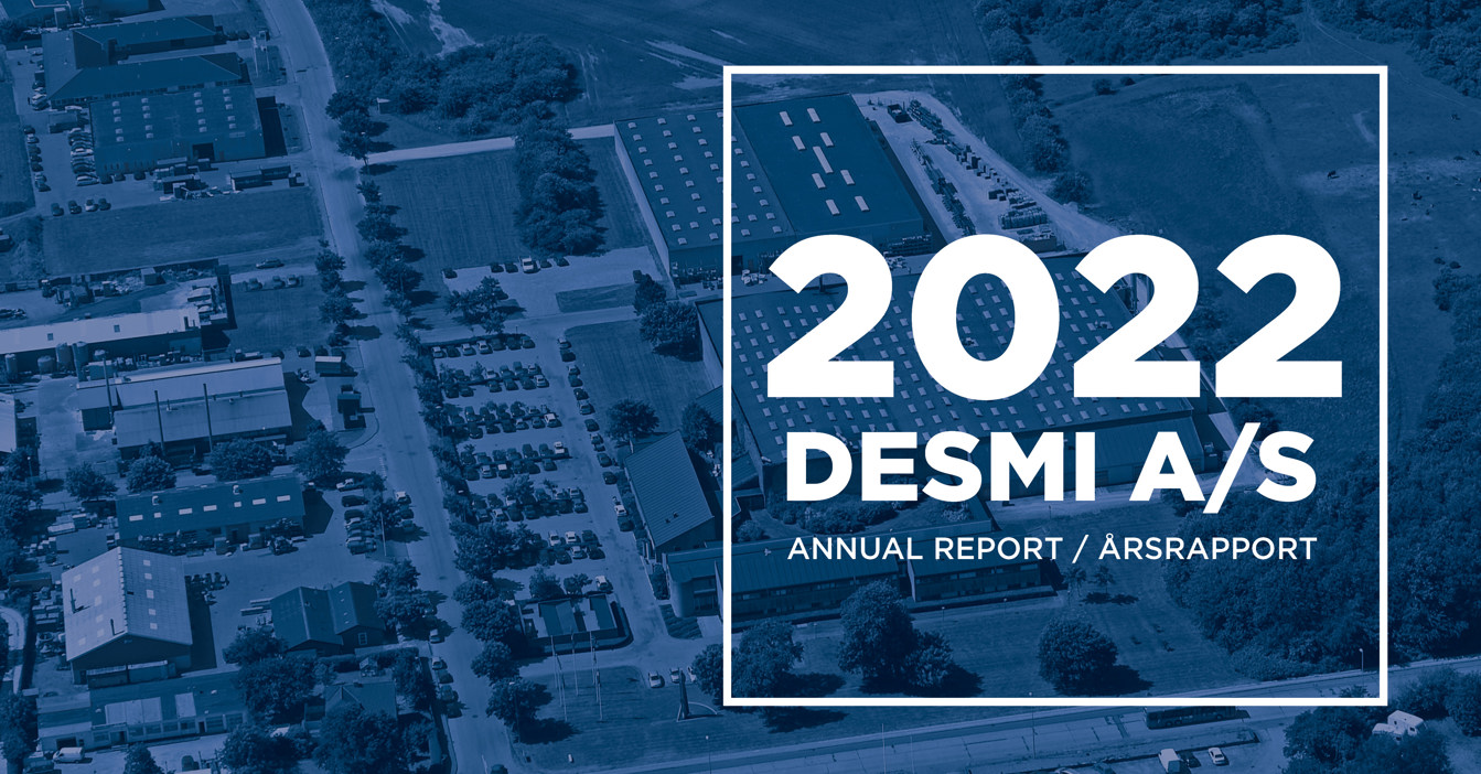 DESMI A/S 2022 annual report cover with aerial view of facilities.