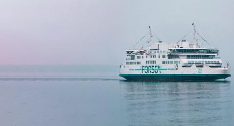 Ferry named Aurora sails calmly in foggy waters, displaying "FORSEA" branding.