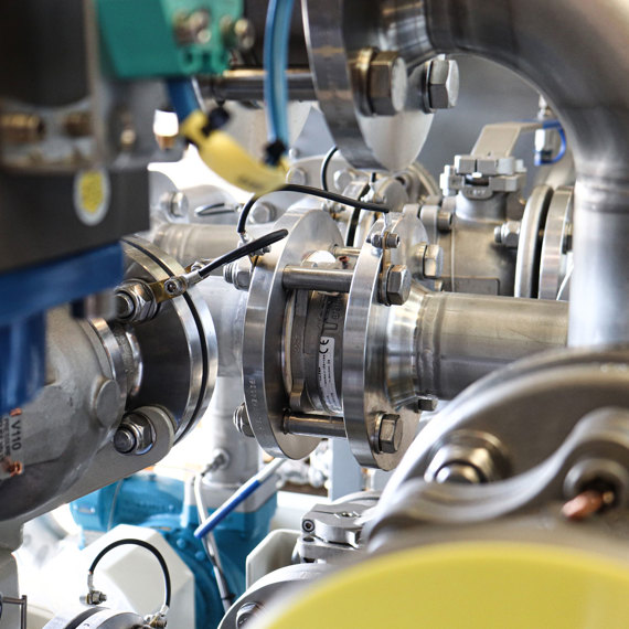 Industrial piping system with valves and connectors for fluid handling applications.