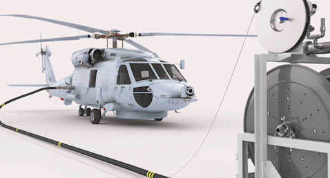 Helicopter refueling from a hose reel system in a hangar setting.