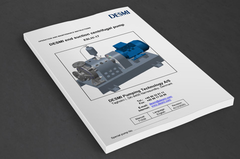DESMI manual for end suction centrifugal pump ESLII-17 on a table.