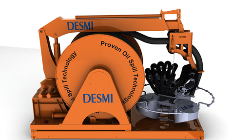 DESMI oil spill recovery system with hose reel and skimmer for fluid handling.