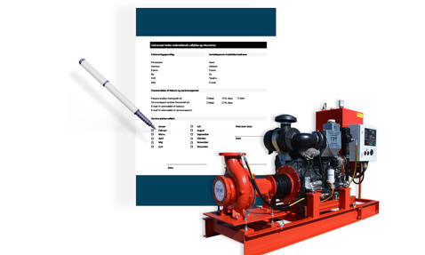DESMI pumpsystem med ett dokument och en penna för serviceplanering.