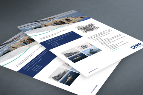 DESMI brochures featuring marine solutions and equipment information on a gray background.
