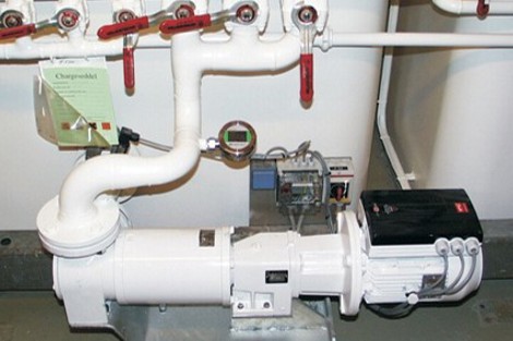 DESMI pump system with pipes and valves for fluid handling operations.
