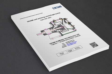 DESMI手册，适用于自吸式离心泵，型号为VAC-2001，置于灰色表面。