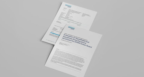 Dos documentos titulados "Evaluation of AquaShield" por DESMI Ocean Guard, sobre un fondo gris.