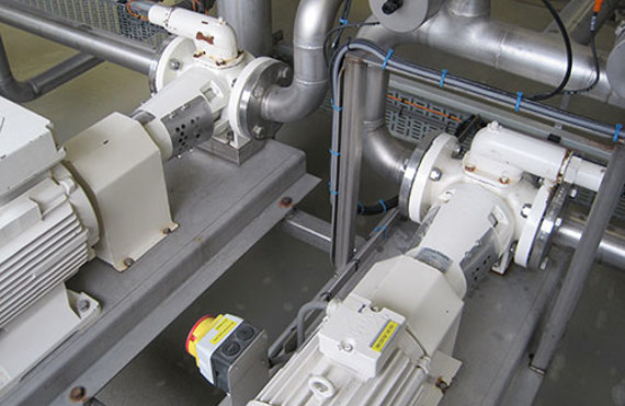 Industrial pumps and piping system for fluid handling, featuring DESMI components.