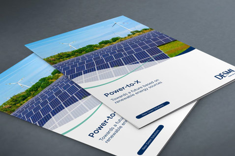 DESMI-broschyrer med solpaneler och vindkraftverk för lösningar inom förnybar energi.
