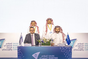 Four men at the Saudi Maritime & Logistics Congress signing ceremony.