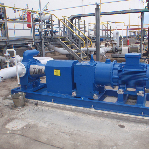 Blue industrial pump system in a facility for fluid handling operations.