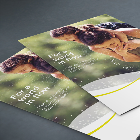 Brochure featuring two children playing, with text "For a world in flow."