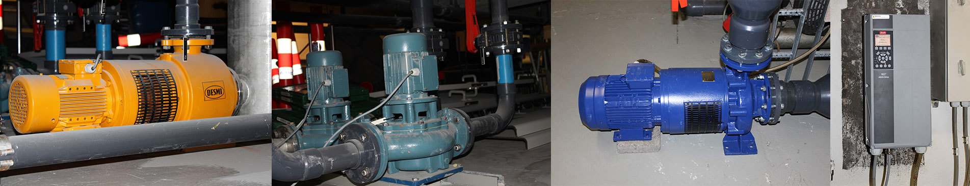 Industrial pumps and motor systems, including a DESMI pump, installed in a facility.