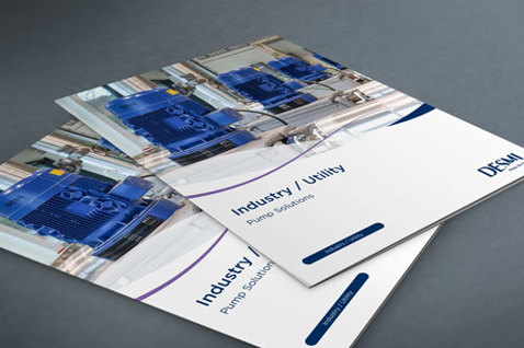 DESMI brochures titled "Industry/Utility Pump Solutions" with blue pump images.
