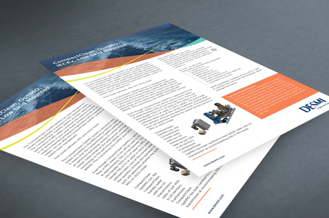 DESMI brochures featuring fluid handling equipment and company information on a table.