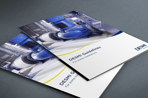 DESMI guidelines booklet for pump installations, featuring blue industrial pump imagery.