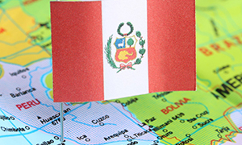 Peru flag on a map highlighting South America, showing Peru and surrounding countries.