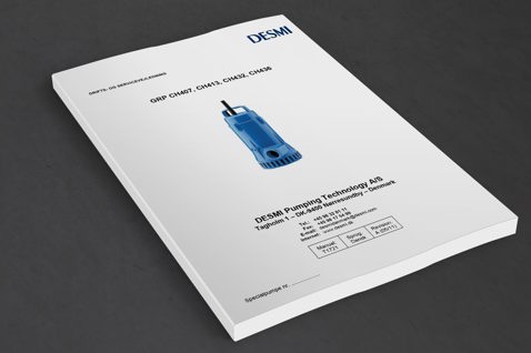 DESMI manual cover featuring GRP submersible pump image and company details.