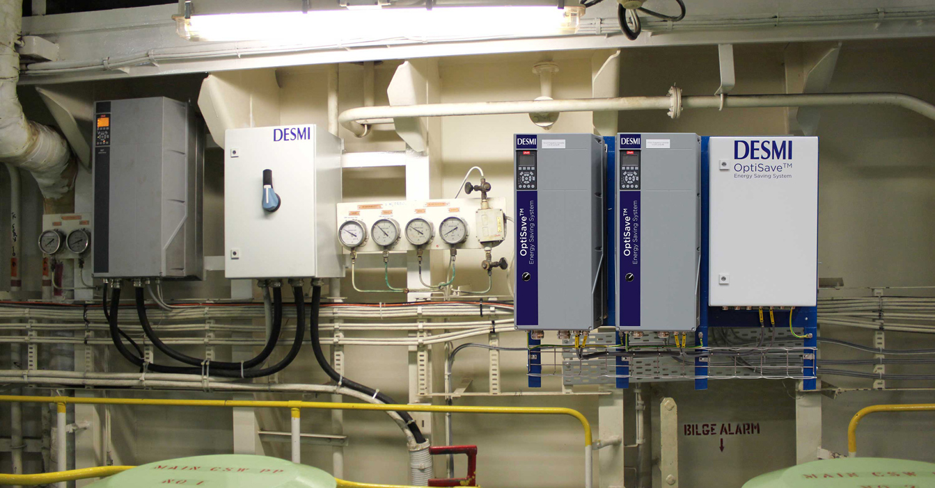 DESMI OptiSave energy-saving system with gauges and control panels for fluid handling.