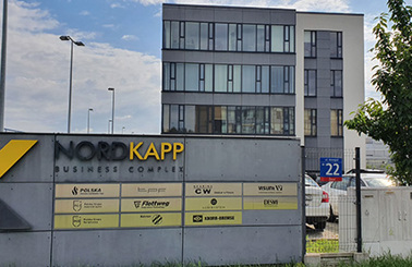 Nord Kapp Business Complex entrance with multiple company logos, including DESMI.