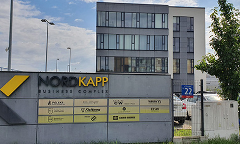 Nord Kapp Business Complex entrance with multiple company logos, including DESMI.