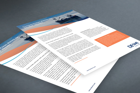 Two DESMI brochures on a table, featuring marine equipment information.