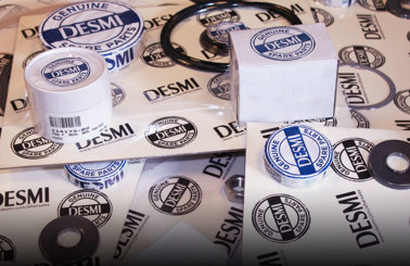 DESMI genuine spare parts packaging, including seals and rings, for fluid handling.