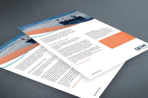 DESMI brochures on a table, featuring marine solutions information and company logo.