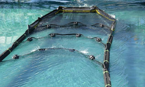 Floating containment boom in a pool for water management and pollution control.