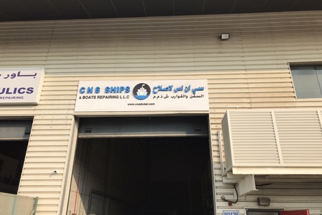C.N.S Ships and Boats Repairing LLC building entrance with signage.