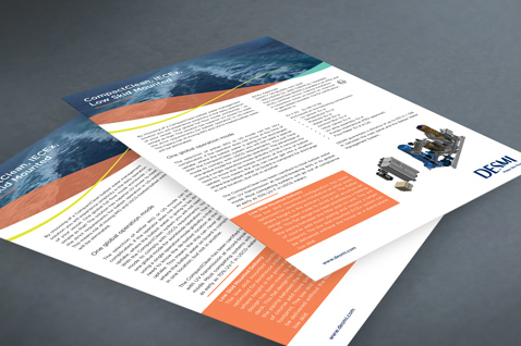 Two DESMI brochures on fluid handling systems displayed on a grey surface.