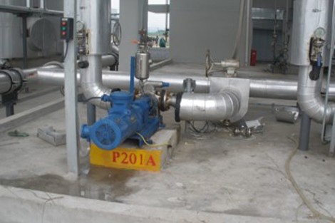 Industrial pump P201A connected to metal piping in a facility.