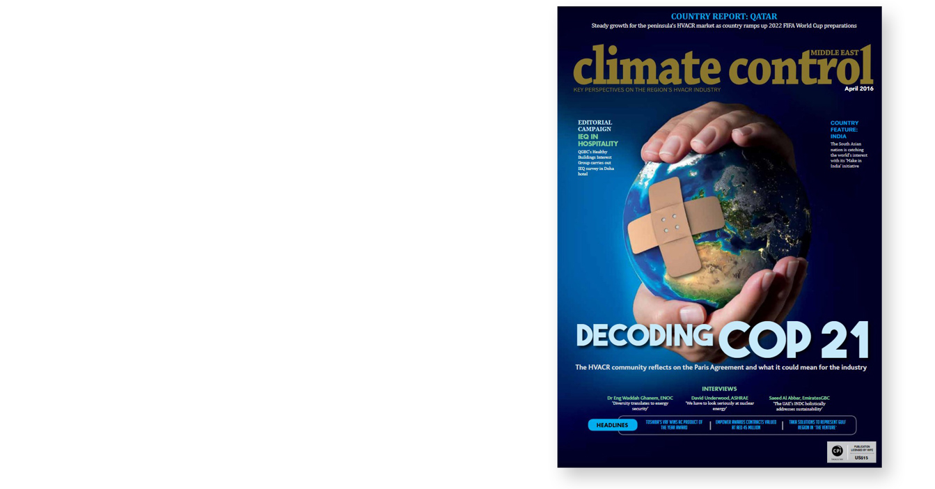 Magazine cover showing Earth with bandages, titled "Decoding COP 21."