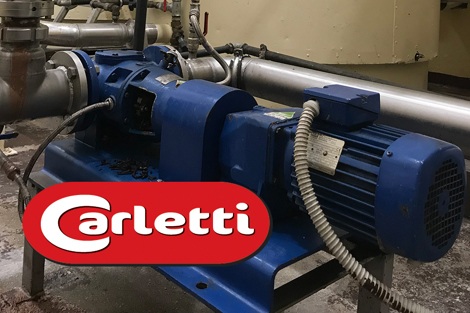 Blue industrial pump with pipes, featuring the Carletti logo in the foreground.
